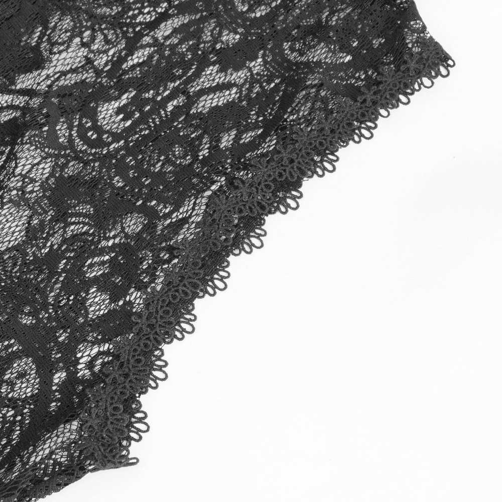 Close-up of elegant black lace fabric featuring intricate detailing for a gothic sleeveless hooded cape.