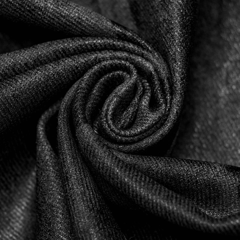 Close-up of black gothic fabric in a spiral, showcasing its texture and sheen for stylish designs.