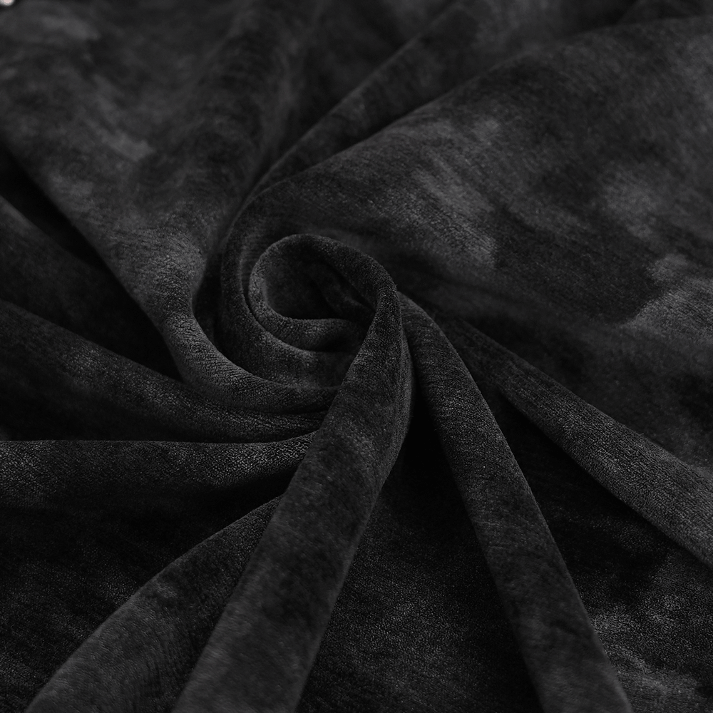 Close-up of luxurious black velvet fabric, showcasing soft texture for gothic slip dress with chains and gloves.