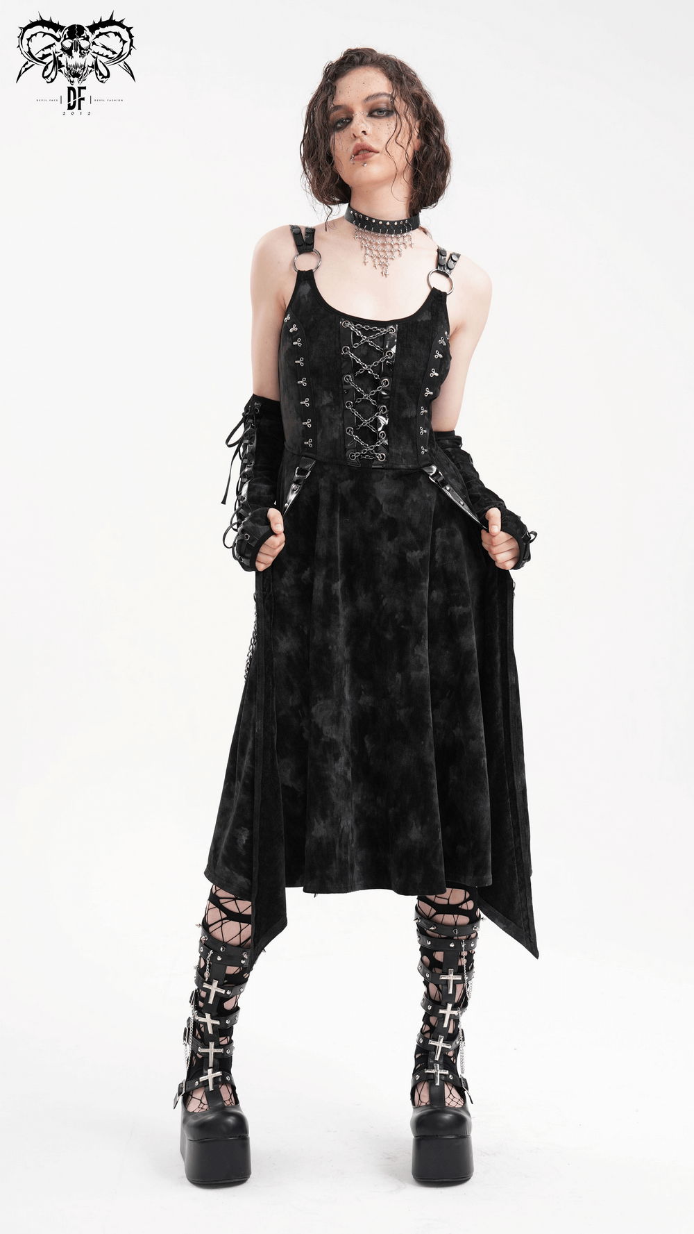 Stunning gothic slip dress with chains and gloves, featuring a black velvet fabric and edgy lace-up details. Perfect for a dark, stylish look.