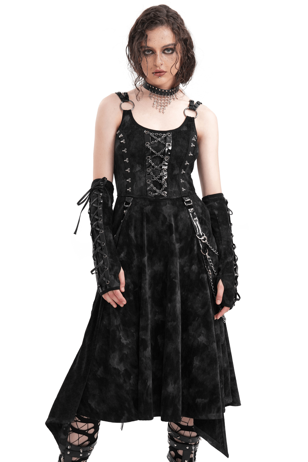 Elegant black velvet gothic slip dress with chains, gloves, and lace-up details, featuring a high-low hem and edgy style.