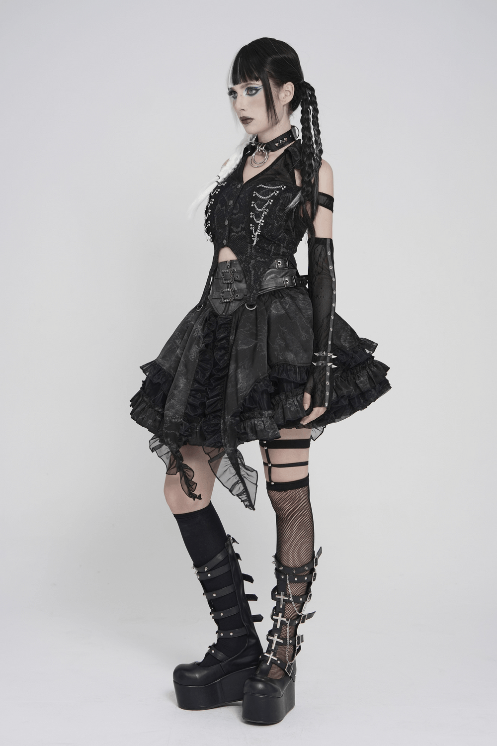 Gothic Snake Print Halter Top with Chain Details worn with a gothic skirt and platform boots, showcasing punk fashion style.