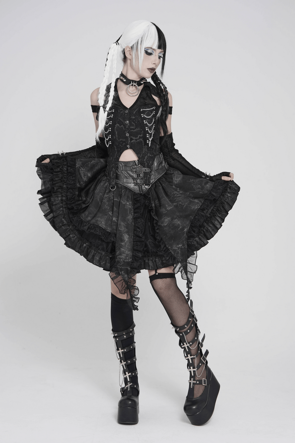 Gothic Snake Print Halter Top with Chain Details styled with a gothic skirt and platform boots, showcasing a punk aesthetic.