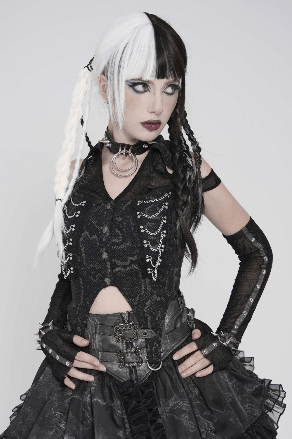 Gothic Snake Print Halter Top with Chain Details worn by a model showcasing punk style and dramatic accessories.
