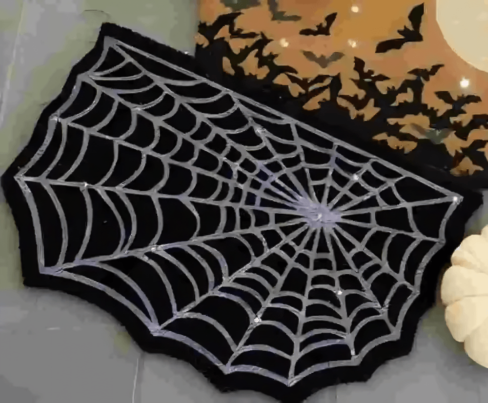 Gothic Spider Web Halloween Rug for Gothic Decor showcasing silver web design on black background, perfect for spooky decor.