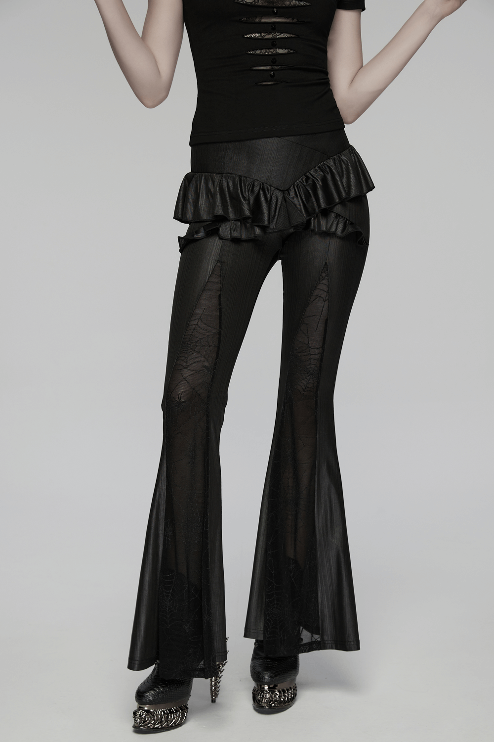 Gothic Spider Web Mesh Flared Pants with Cross Waist showcased on model, featuring elegant mesh and ruffled design.