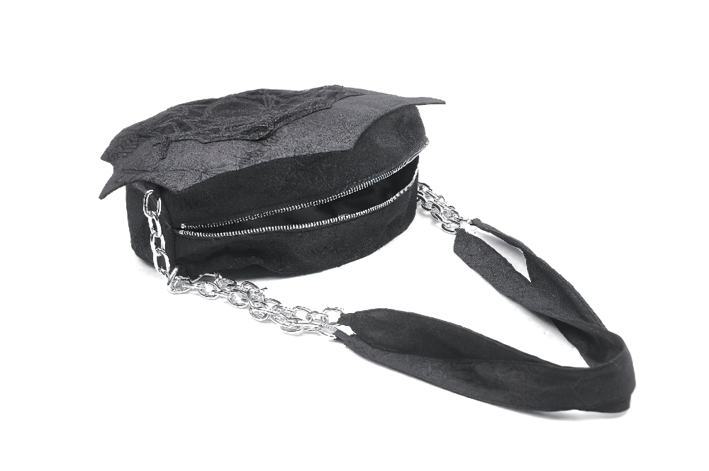 Gothic spider web shoulder bag with silver chain straps and embroidered design, perfect for a stylish and eerie look.