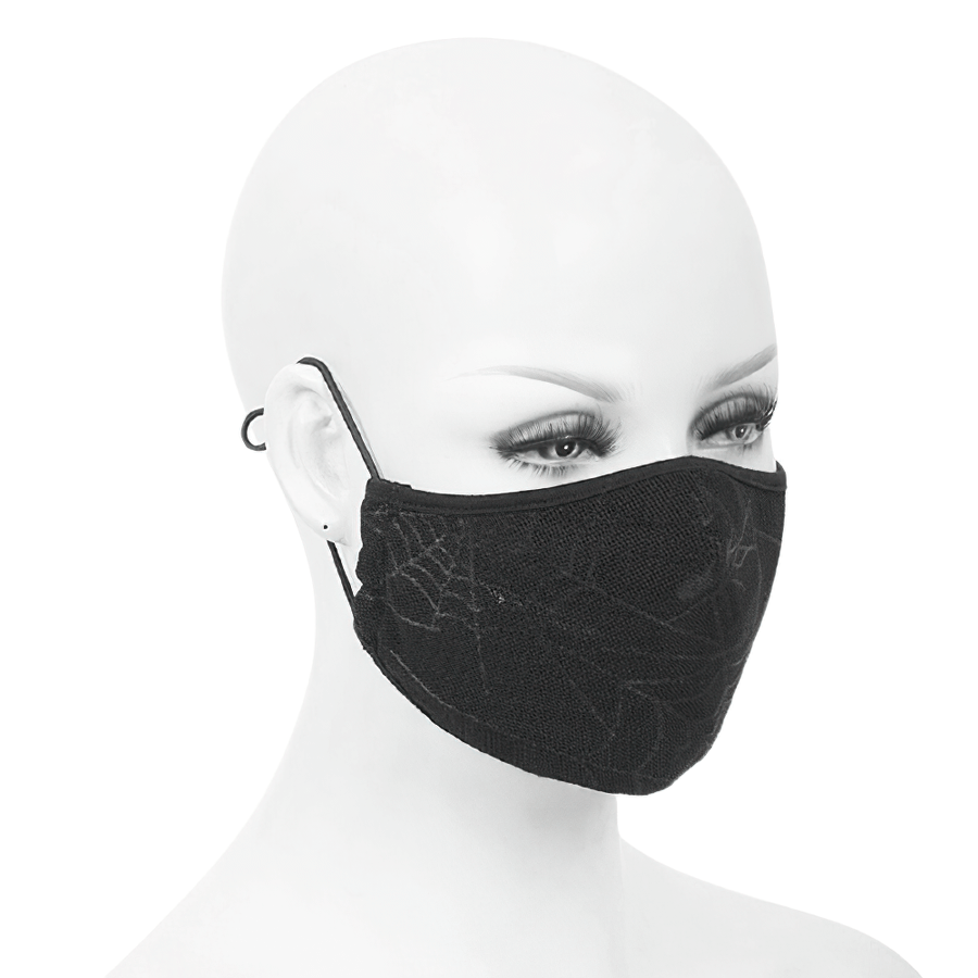 Gothic black spiderweb face mask on a mannequin displaying adjustable straps and breathable fabric.