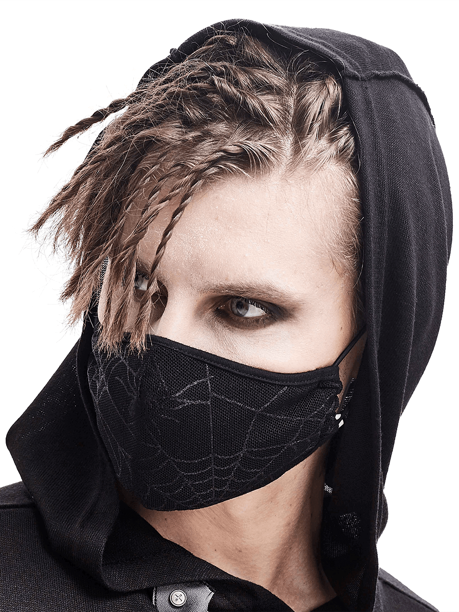 Gothic black spiderweb face mask on model with braided hair and hooded sweatshirt, perfect for stylish outfits.