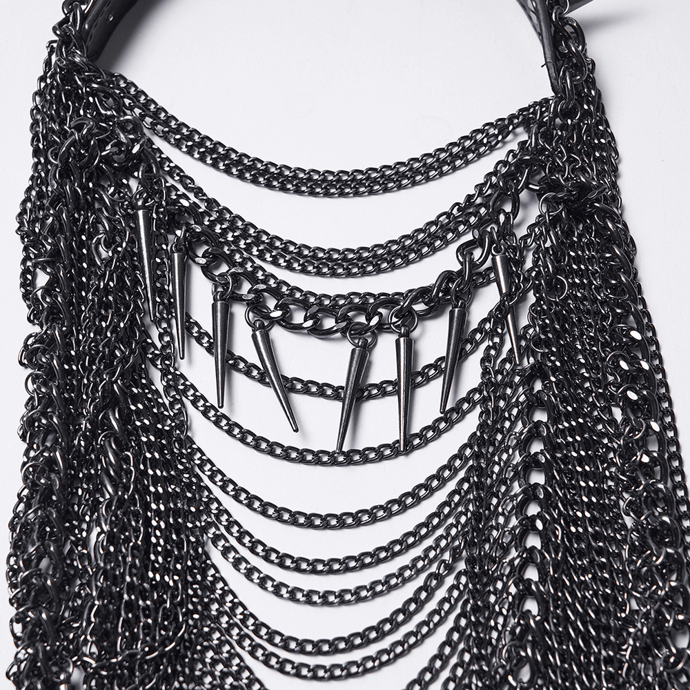 Close-up of gothic spiked chain headpiece featuring layered chains and thorn-like spikes.