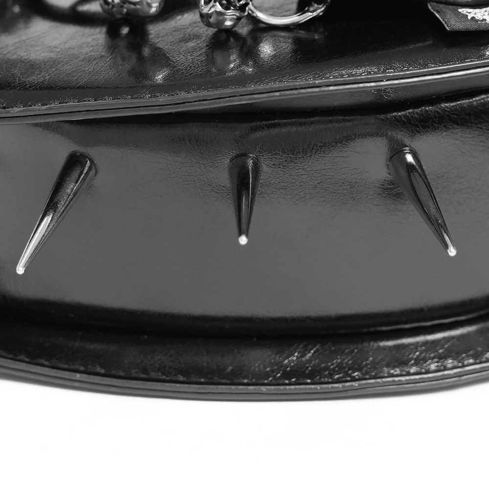 Close-up of Gothic Spiked Heart Handbag with Pentagram Charm showing metal spikes and details.