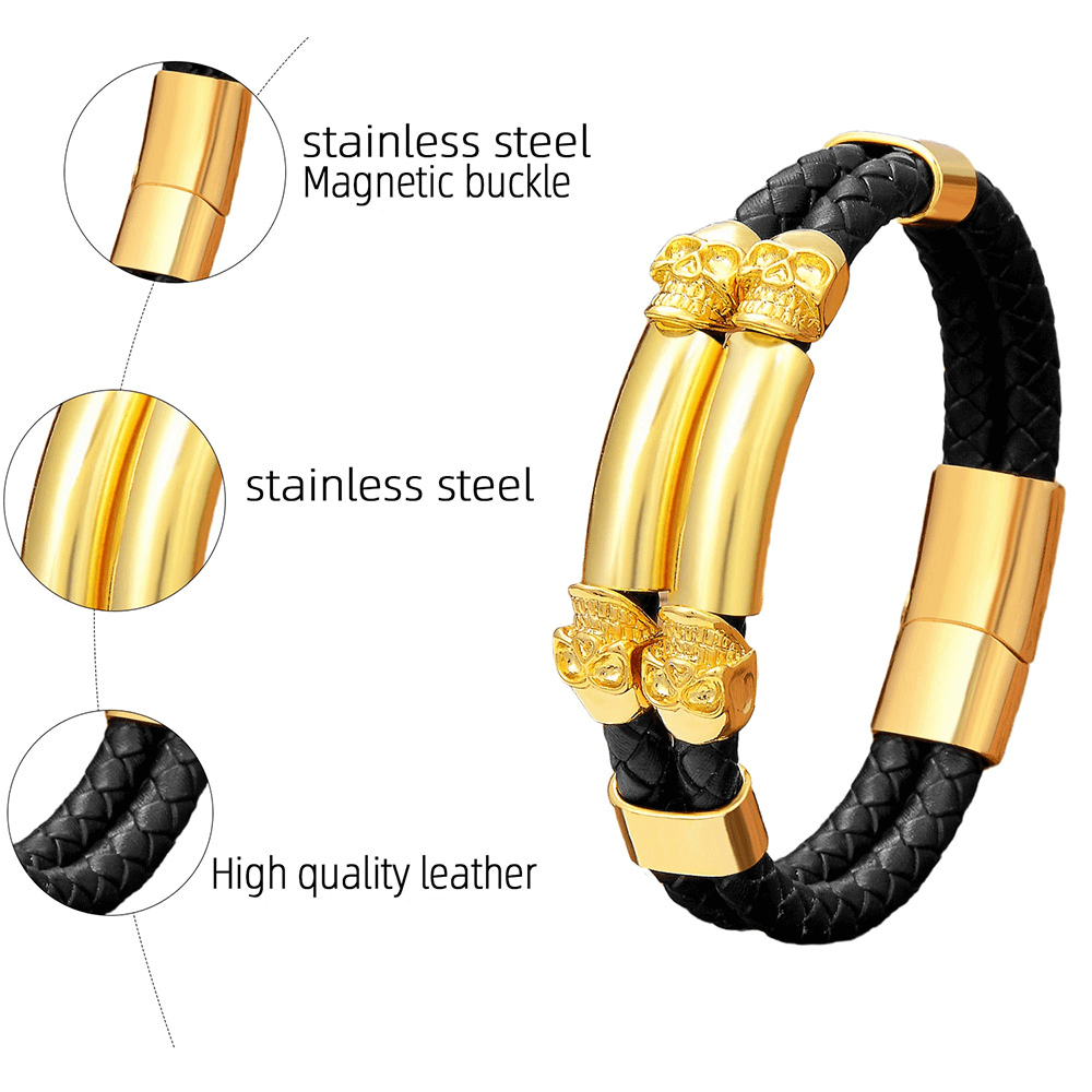 Gothic stainless steel bracelet with gold skulls and black leather, featuring a magnetic buckle for easy wear.