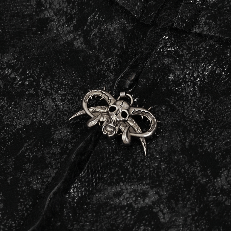 Gothic black jacket detail featuring a metal skull and horns charm, stylish and edgy design accent.