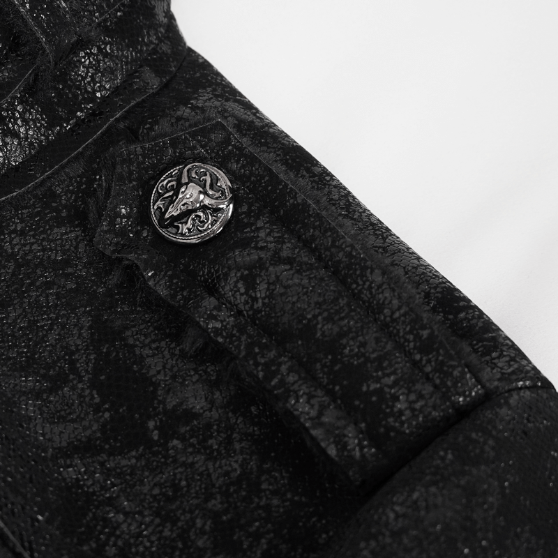 Close-up of the gothic jacket sleeve featuring a decorative black button on textured fabric.
