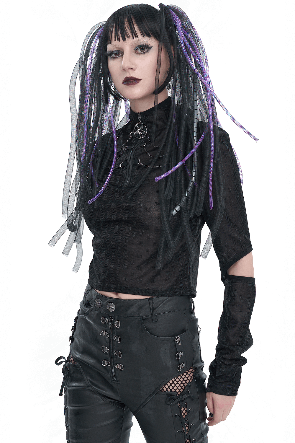 Gothic long-sleeve top with pentagram zipper, stylishly paired with black pants and unique hairstyle.