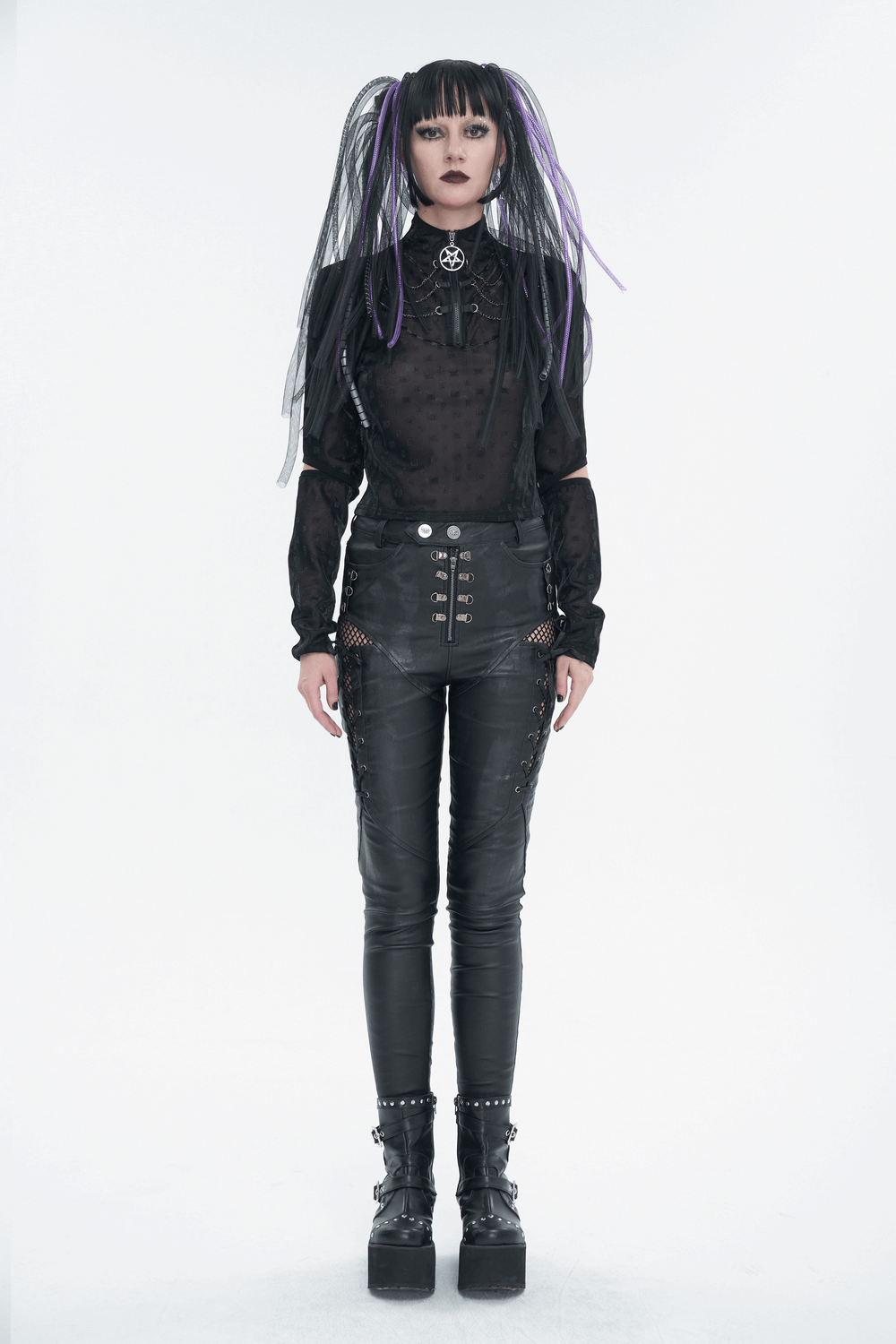 Gothic women's top with stand collar and pentagram zipper, paired with stylish black pants and platform boots.