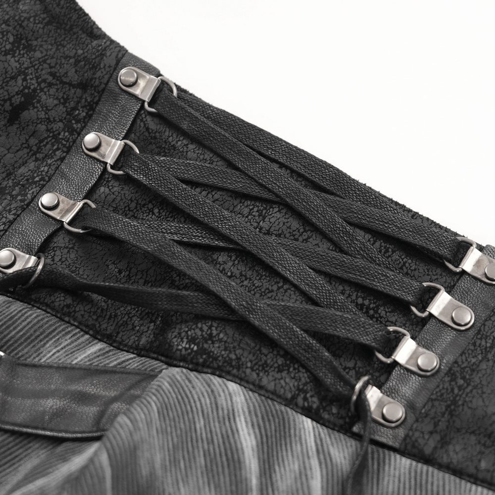 Close-up of lace-up waist detail on a gothic steampunk corset skirt showcasing intricate design elements.