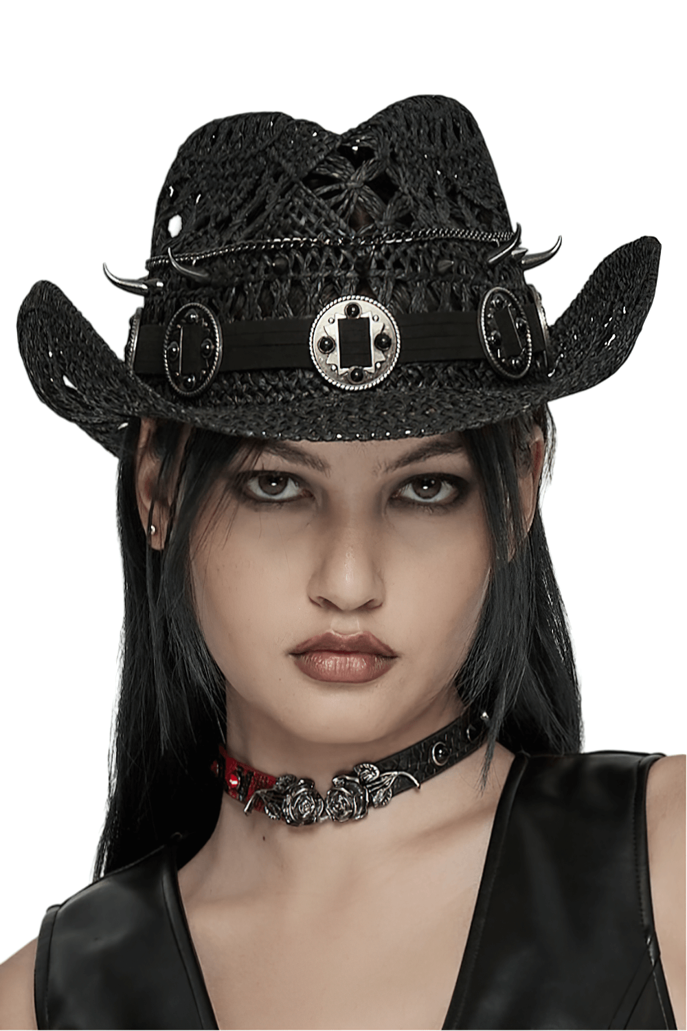 Gothic straw cowboy hat with spikes, iron rings, and tassel, styled for a punk fashion statement.