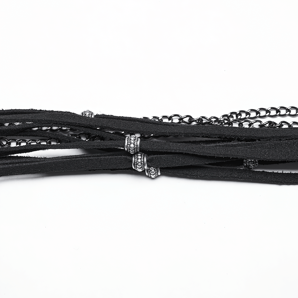 Black faux leather cords with metallic accents and chains for punk accessories.