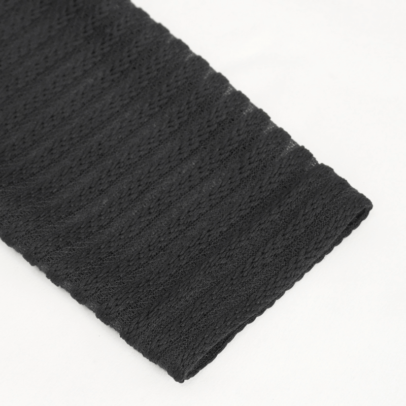 Close-up of a textured black fabric showcasing a wavy pattern, ideal for gothic fashion.