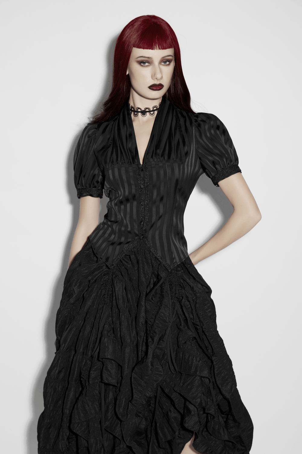 Gothic Striped Shirt with V-Neck and Puff Sleeves worn by model, featuring fitted bodice and dramatic puff sleeves.