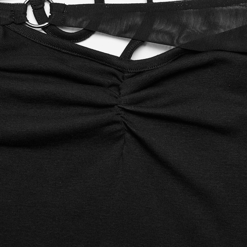 Close-up of the unique folding design and black mesh details of a Gothic style asymmetric dress.