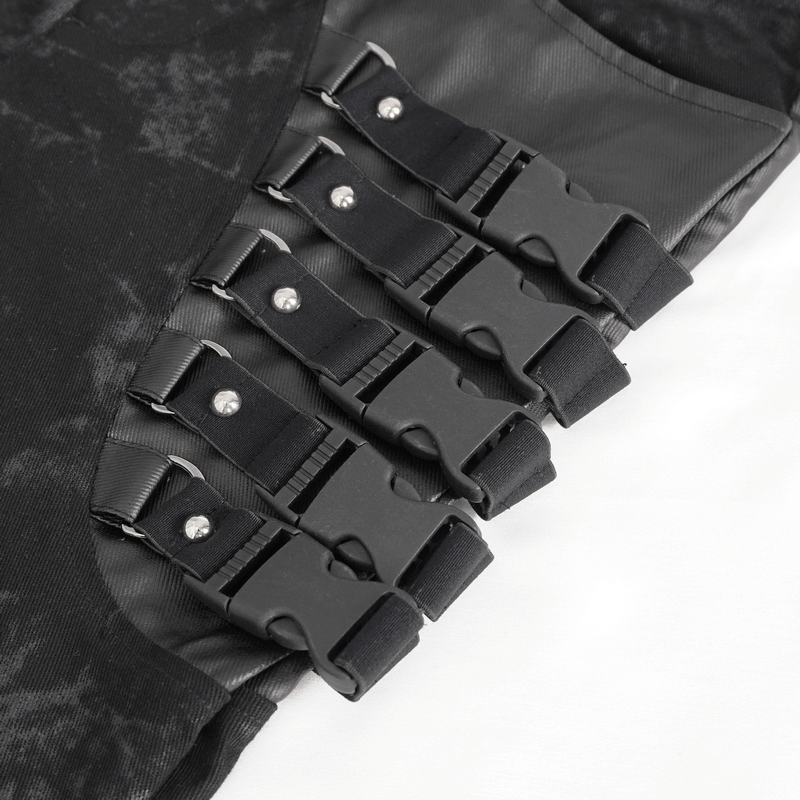 Close-up of black buckles and straps on gothic style trousers for men, showcasing edgy fashion details.