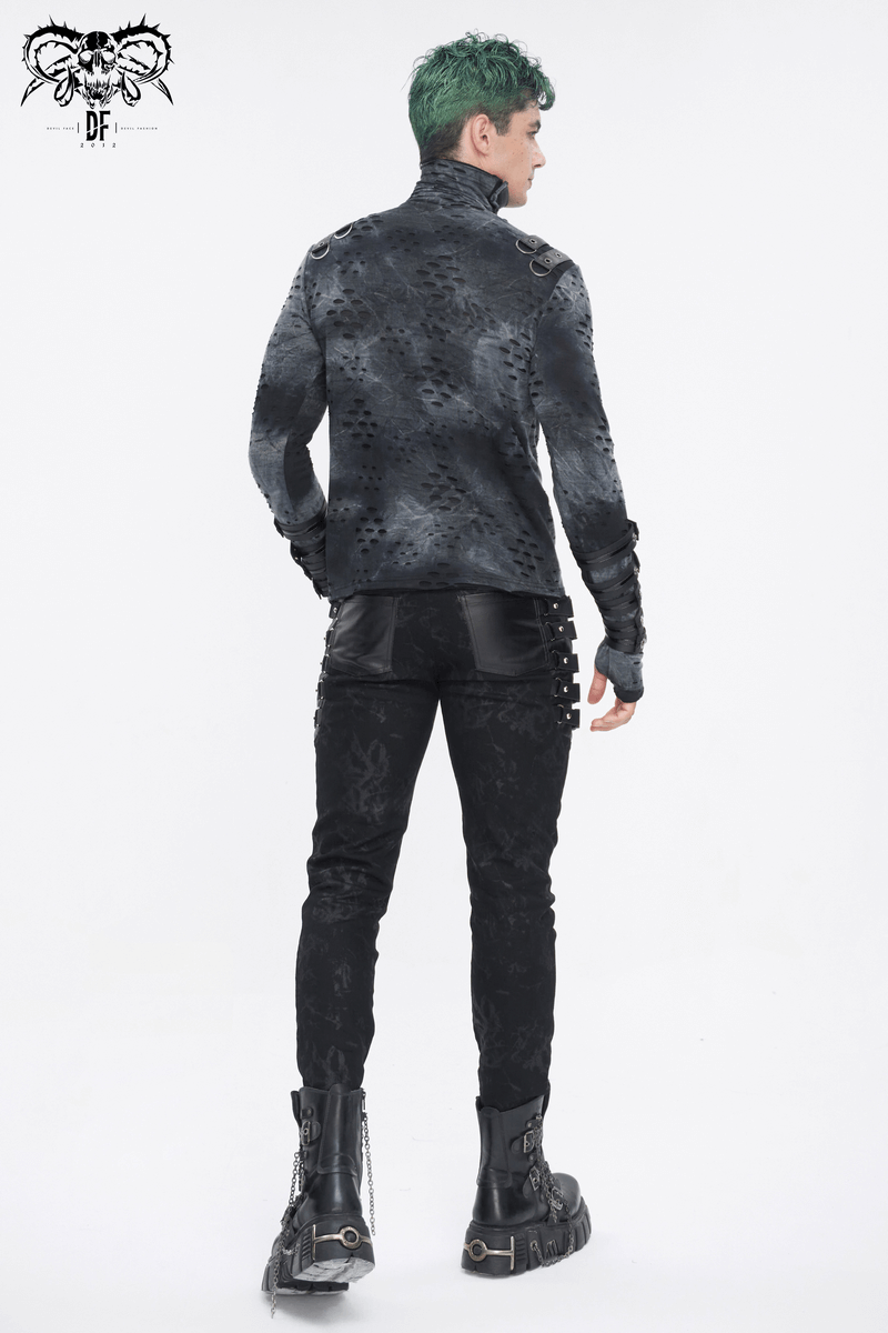 Men's gothic style outfit featuring a black patterned jacket and fitted trousers with edgy boots.