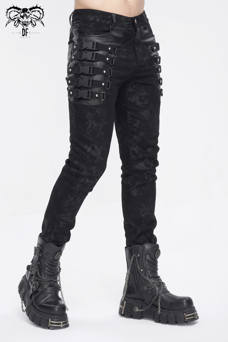 Men's gothic black buckled trousers showcasing edgy straps and sleek design, perfect for a bold fashion statement.