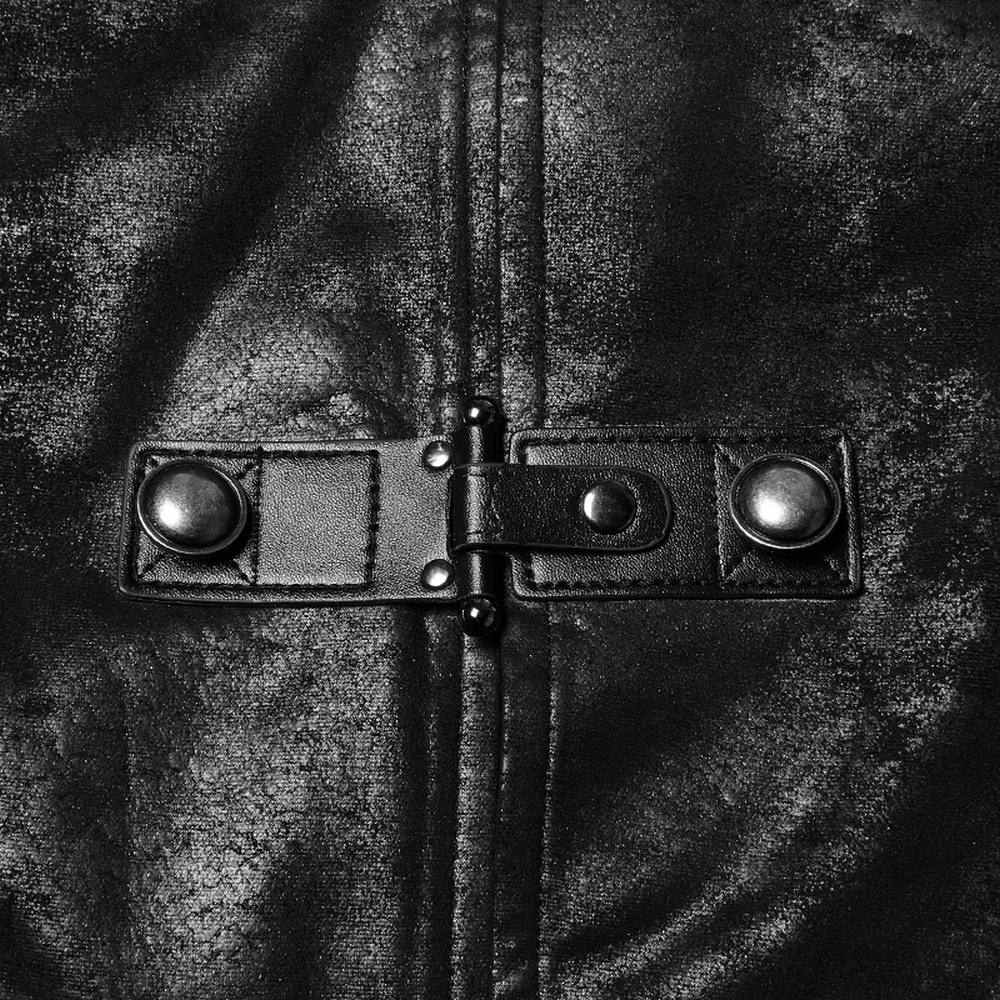Close-up of Gothic black leather buckle detail on long cape for men, showcasing unique design and craftsmanship.