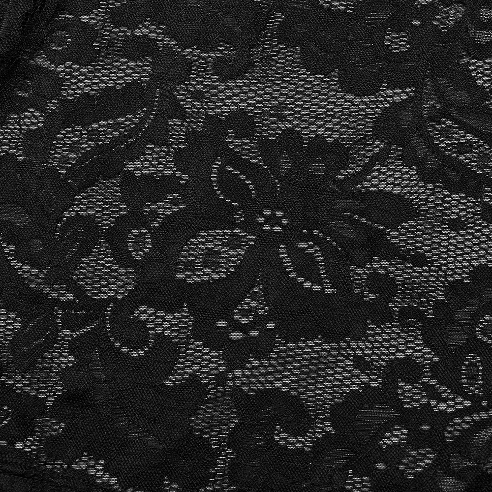 Close-up of intricate black lace fabric, perfect for gothic-style evening gowns.