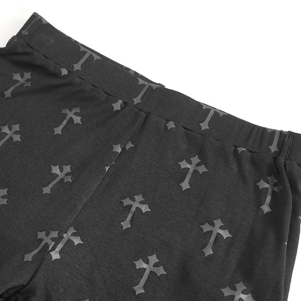 Gothic cross patterned leggings showcasing dark, punk style for women, perfect for a bold statement look.