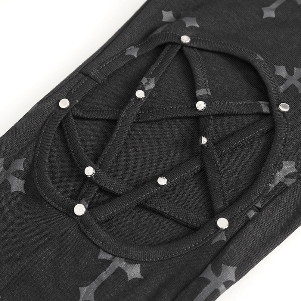 Gothic cross lace-up leggings detail showcasing intricate cross pattern and eye-catching lace-up design.