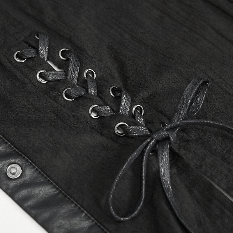 Stylish black blouse with lace-up detailing and silver rivets, perfect for punk rock fashion lovers.