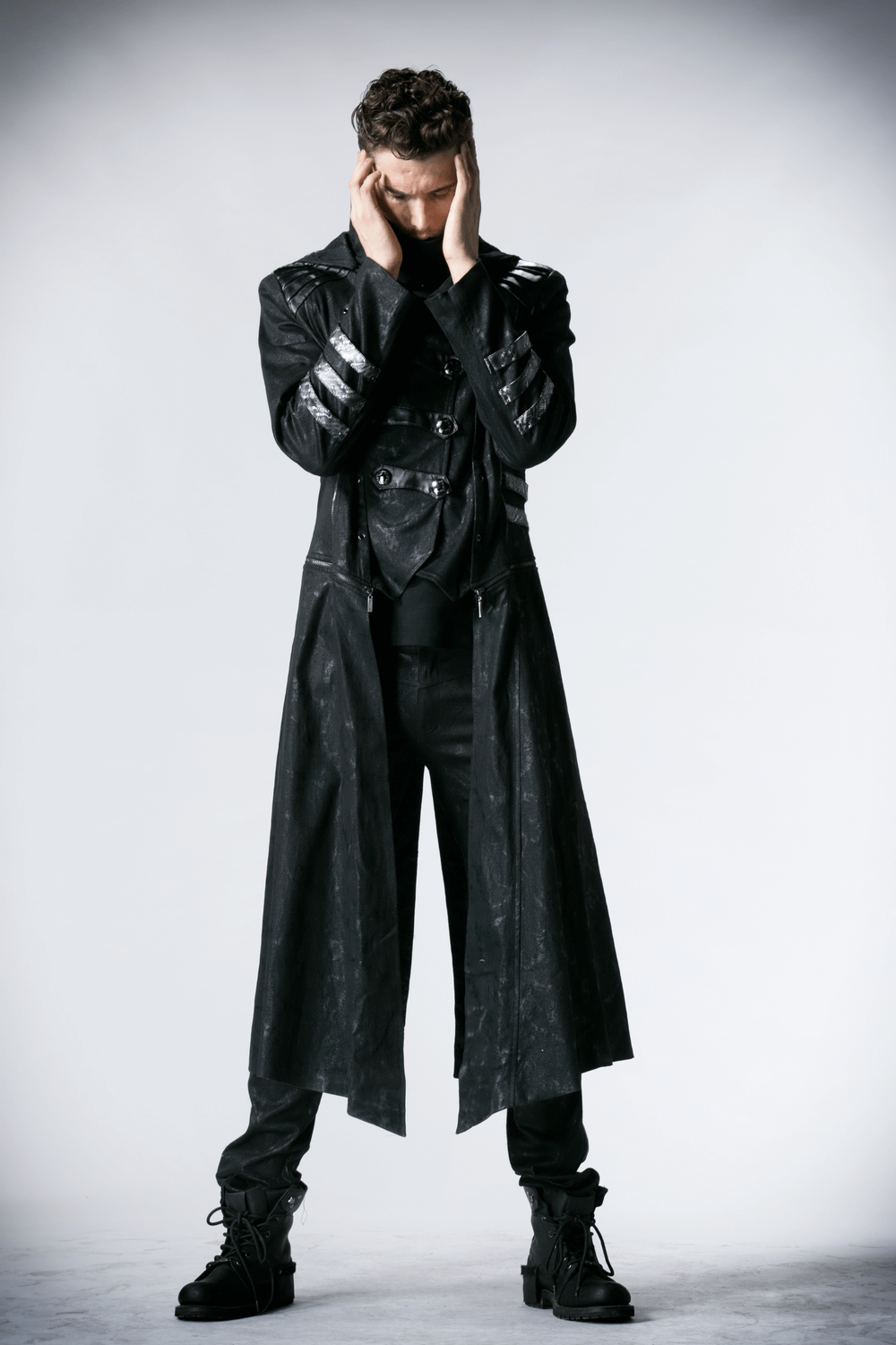 Men's full-length gothic hooded coat with buckles, embodying bold gothic fashion and edgy style.