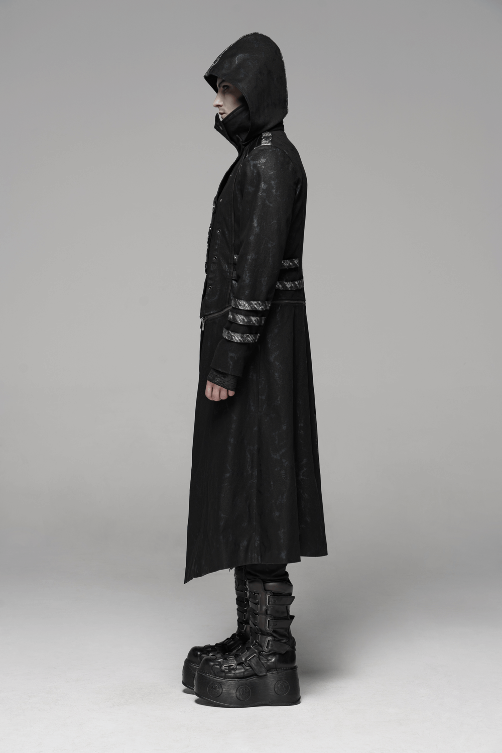 Men's Gothic hooded longline coat in black with statement buckles and dramatic silhouette.
