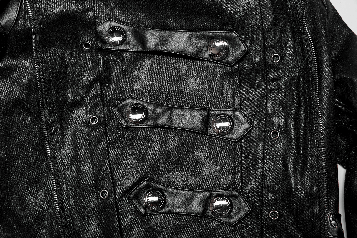 Close-up of the black gothic coat's buckle details and textured fabric, showcasing gothic fashion style.
