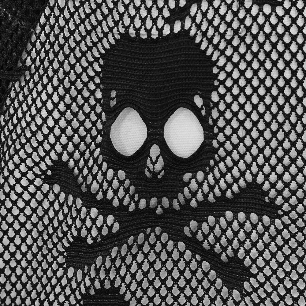Close-up of gothic men's black mesh top featuring a skull pattern and torn inserts for a trendy alternative look.