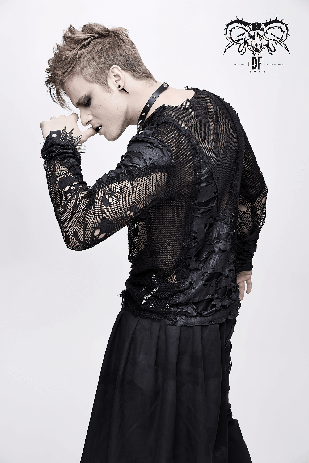 Gothic style men's black mesh top with skull pattern, showcasing torn inserts and a trendy edgy look.
