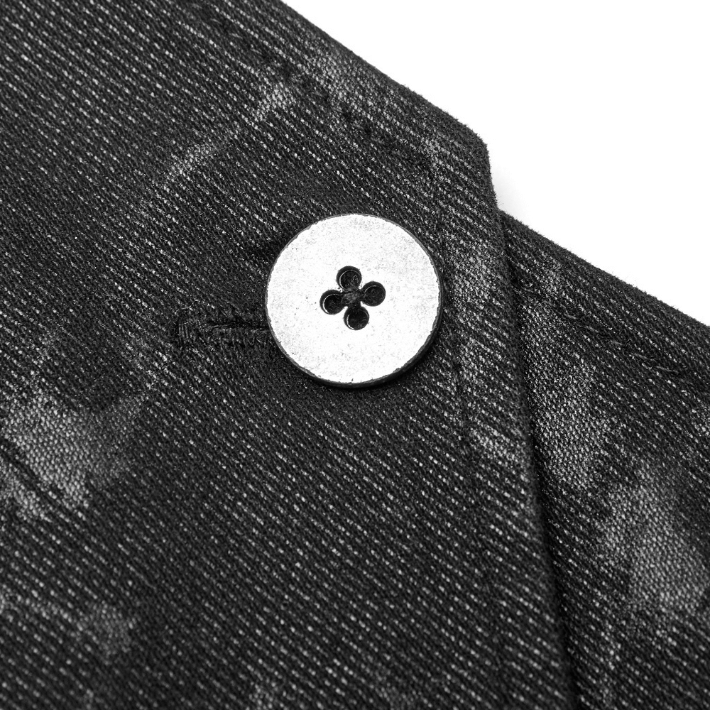 Close-up of silver metal button on black mottled Gothic vest, showcasing unique textured fabric and design details.
