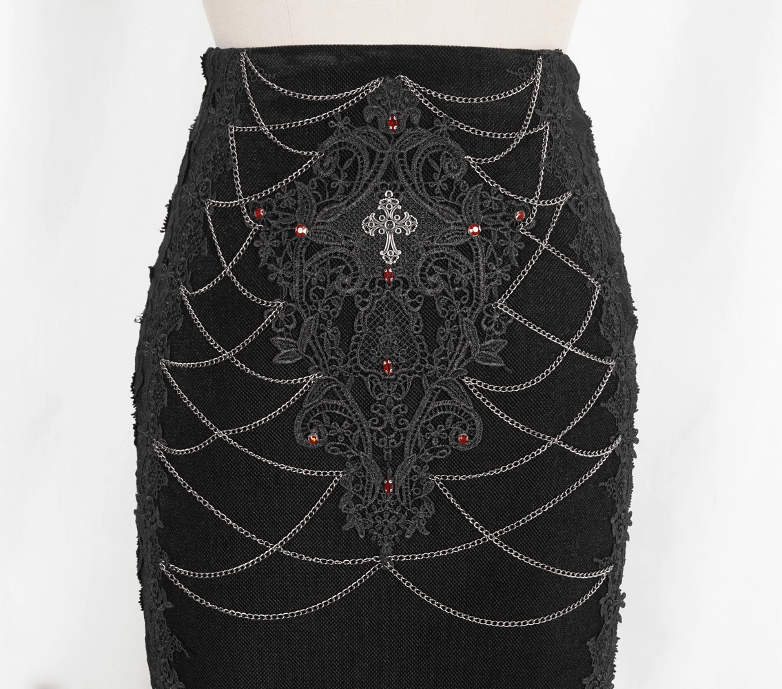 Gothic-style black skirt with intricate lace overlay and red floral accents, perfect for alternative fashion lovers.
