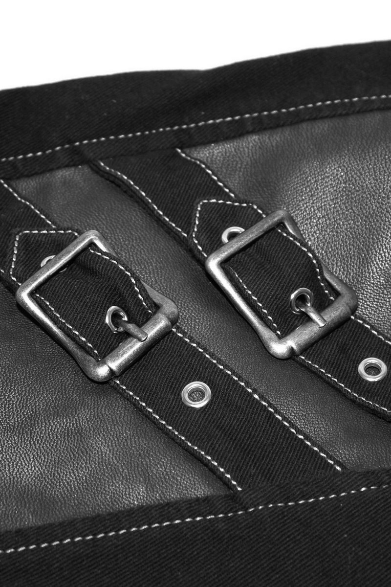 Close-up of dual buckle straps on gothic style men's black pants, featuring silver metal accents for a trendy look.