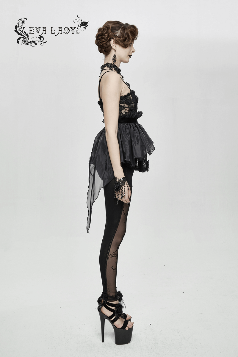 Side view of a model wearing a gothic style black transparent lace asymmetric top and stylish leggings.
