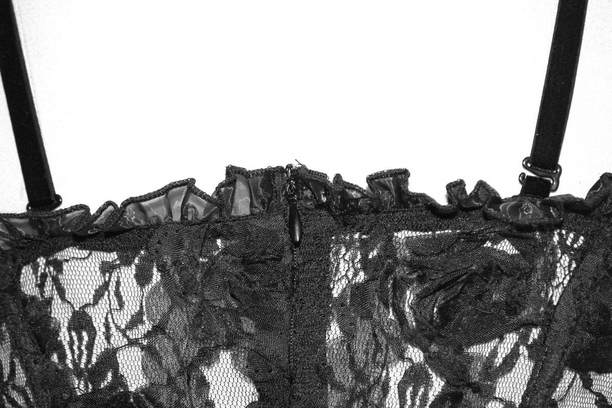 Gothic style transparent lace asymmetric top with floral design and straps, perfect for a stylish black outfit.