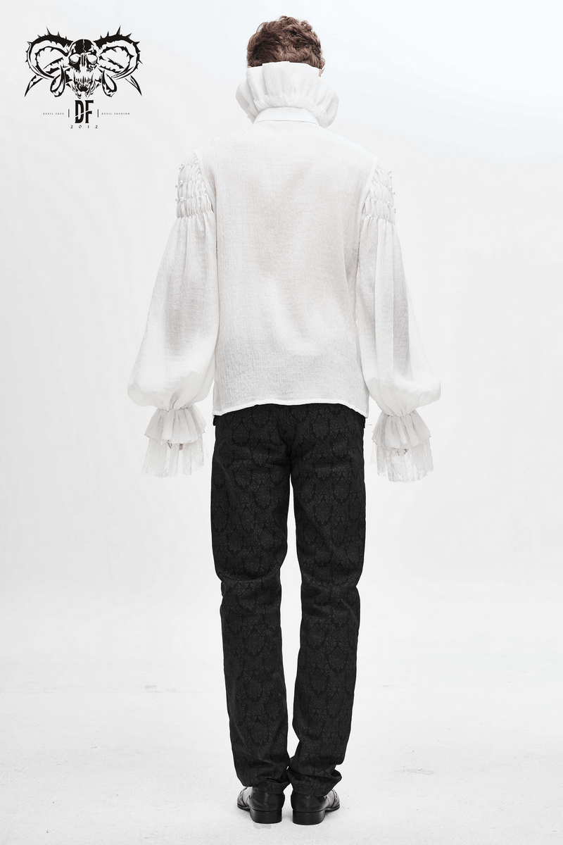 Back view of a gothic white long sleeve shirt with lace cuffs and ruffles, paired with black patterned pants.