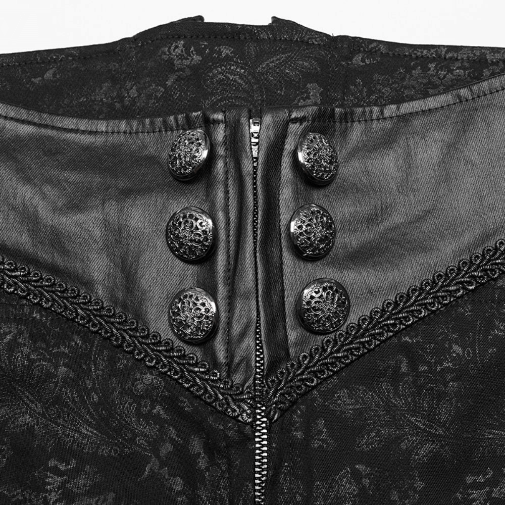 Close-up of gothic black lace-up skinny jeans showcasing decorative buttons and stylish embossed fabric.