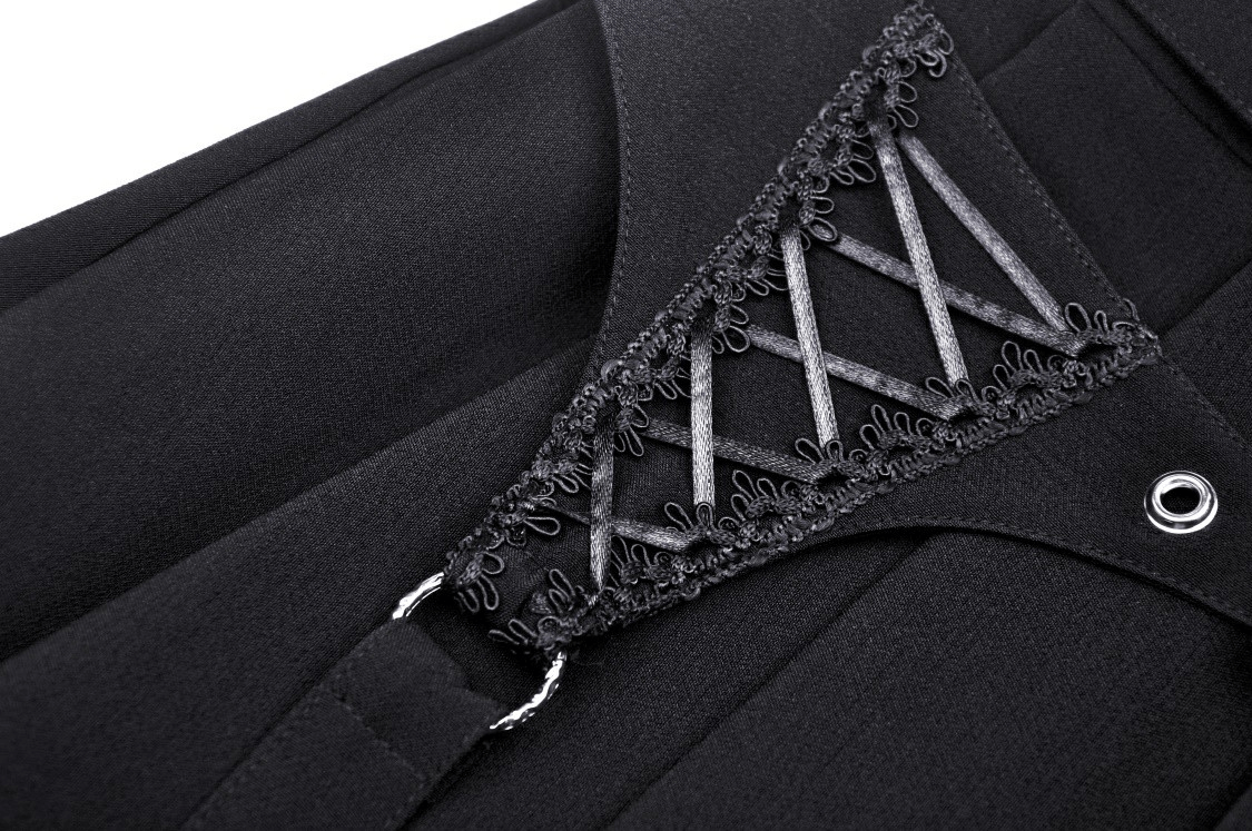 Close-up of black pleated skirt featuring delicate lace-up design and silver buckle detail.