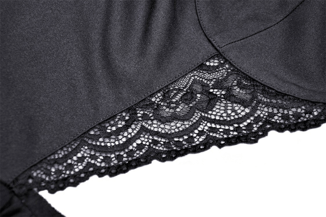 Close-up of elegant black fabric featuring delicate lace detailing, ideal for gothic fashion attire.