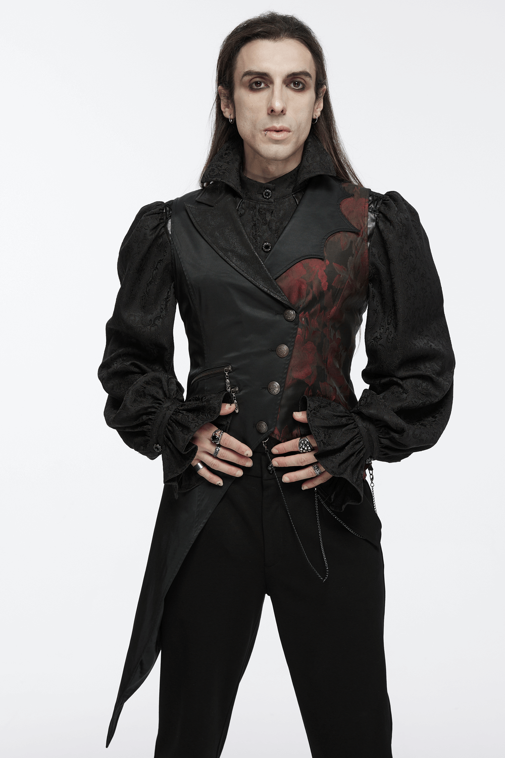 Gothic tailcoat vest in black with red brocade detail, asymmetrical hem, and silver-tone chains, perfect for vampire-inspired fashion.