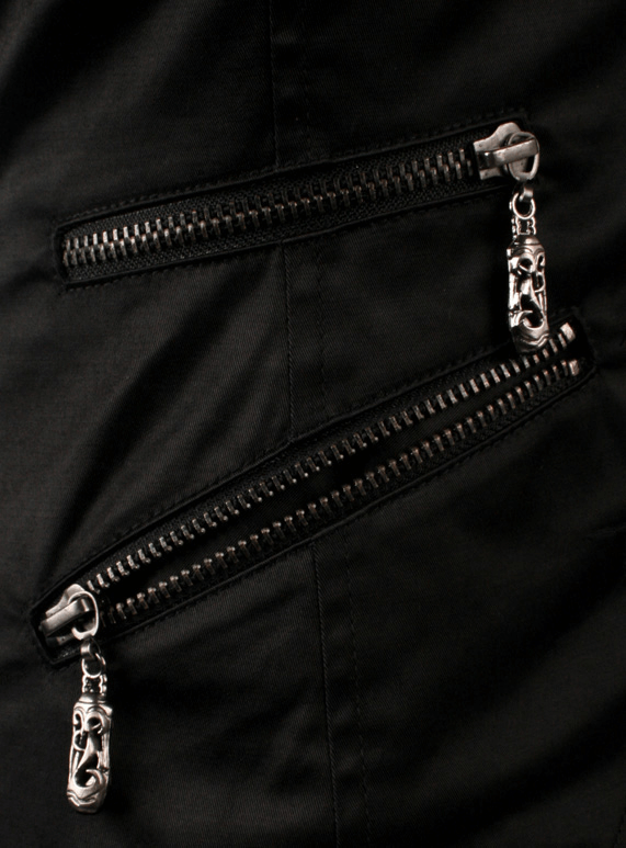 Close-up of gothic tailcoat vest showcasing intricate silver zippers and detailed metal pull tabs.
